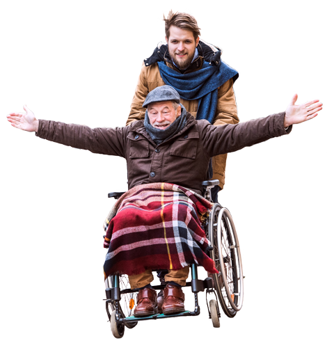 Sohn schiebt Vater im Rollstuhl